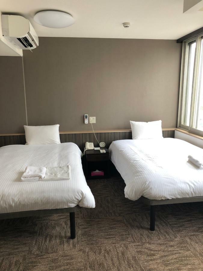 Hotel Tetora Asahikawa Station Bagian luar foto