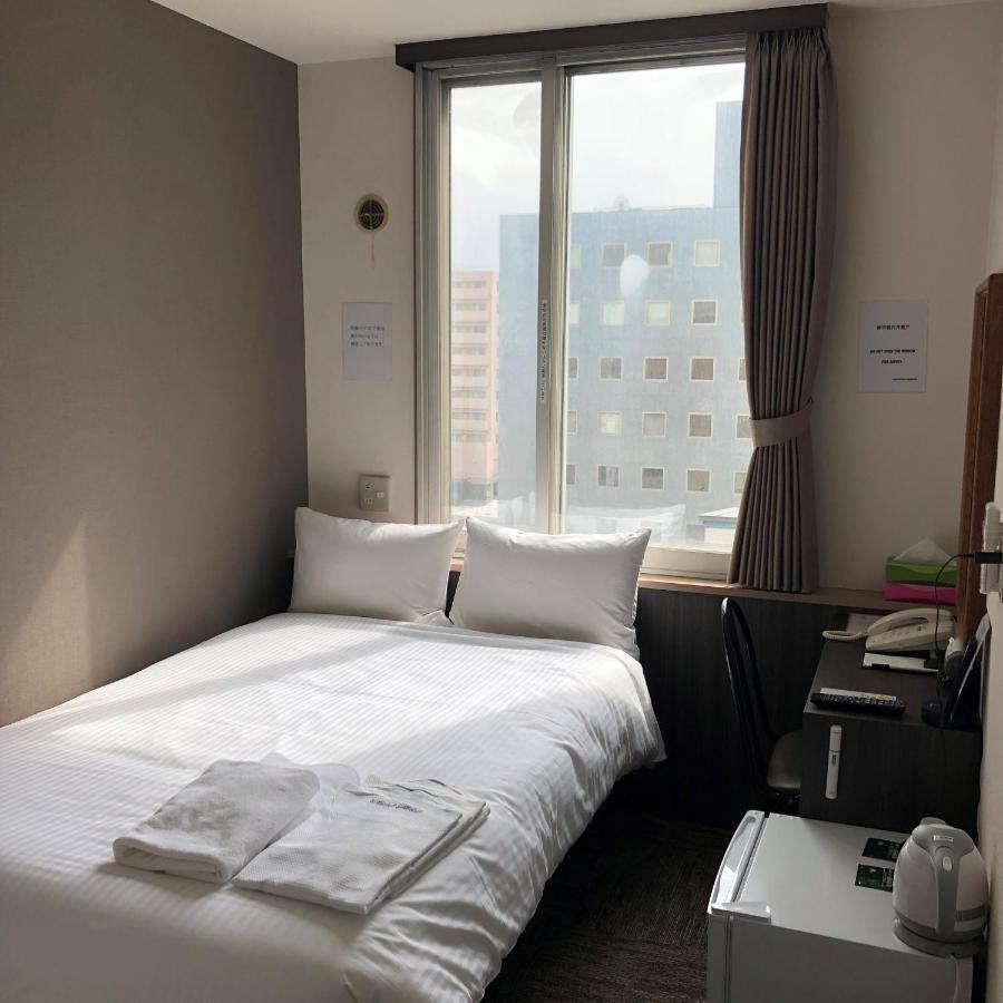 Hotel Tetora Asahikawa Station Bagian luar foto