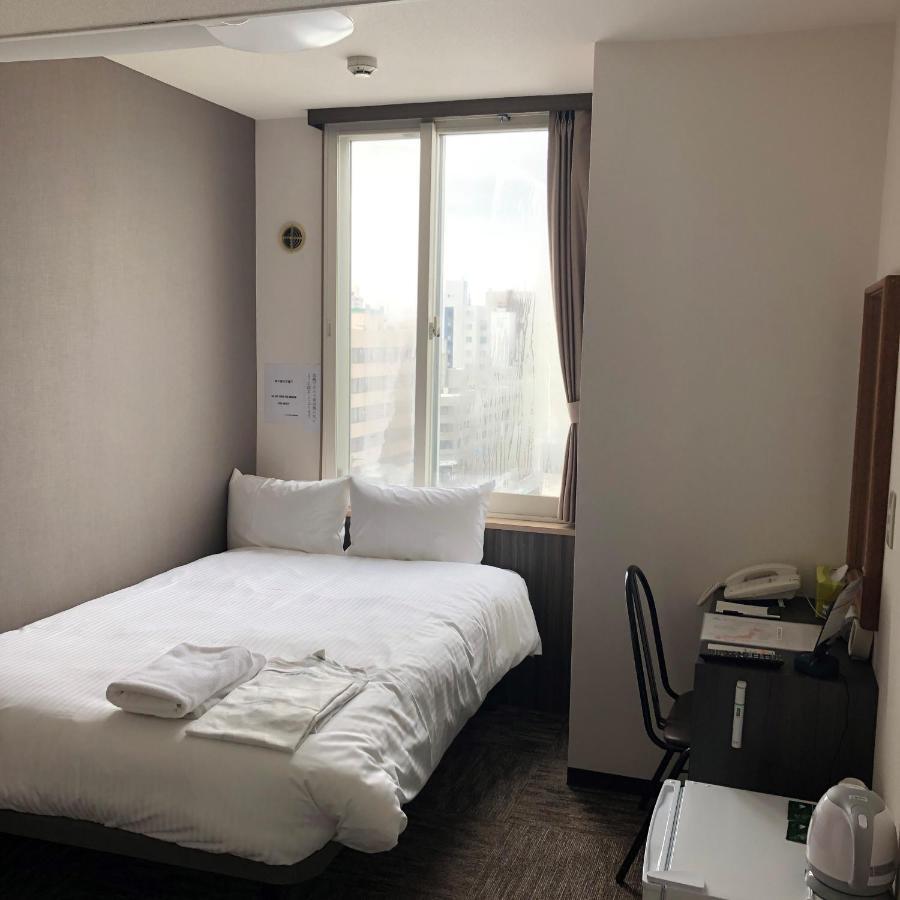 Hotel Tetora Asahikawa Station Bagian luar foto